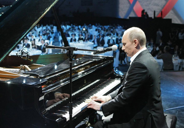 Putin sings, plays piano at charity concert