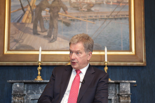 Finnish leader talks trade, climate change with President Xi