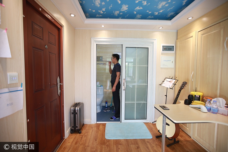 Businessman makes home in container