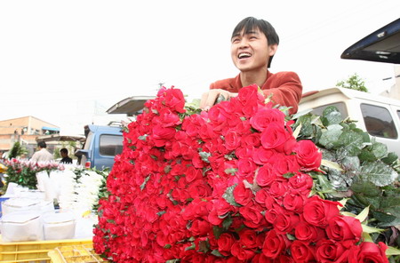 Desire for Valentine's roses pushing up prices