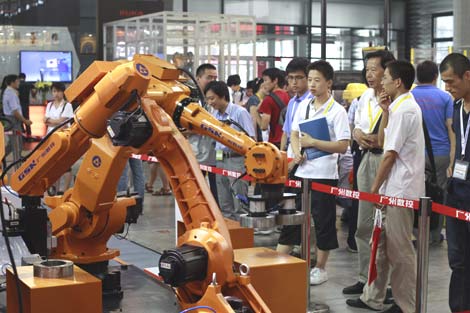Rising wages should feed robot boom: experts