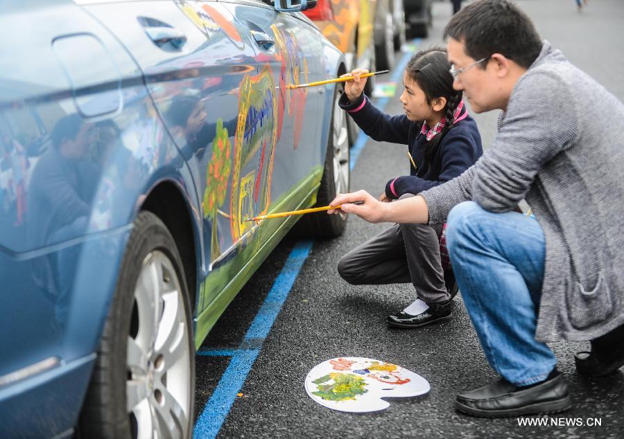 Cars with colorful cartoon drawings parade in Hangzhou