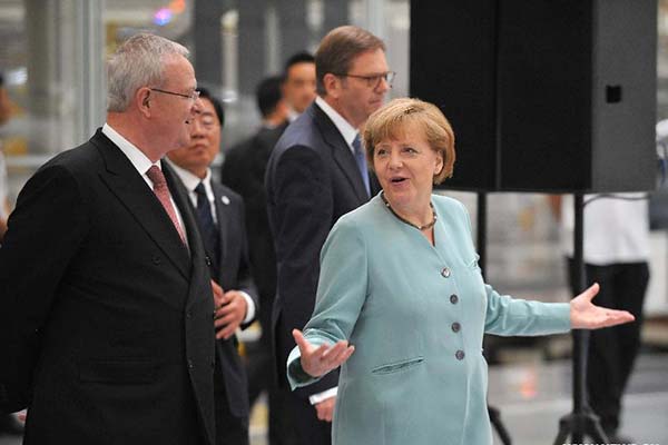 Factory's energy efforts thrill German leader