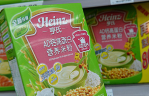 After food safety scares, China retailer offers baby milk insurance