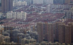 China's eased mortgage policies spur sales, sector pressure remains