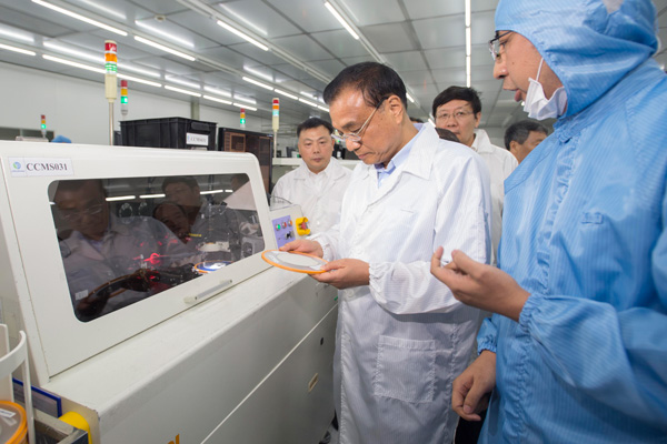 Premier Li: High-tech manufacturers to build brands and new business models