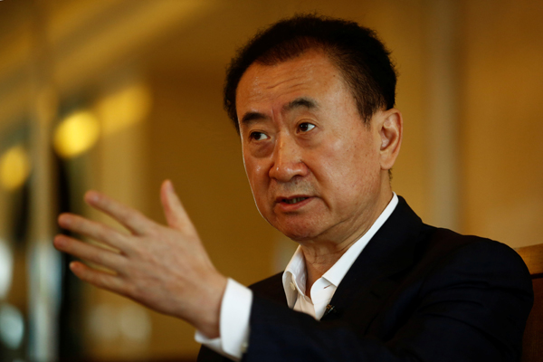 China's richest man set to seal two billion-dollar US film deals