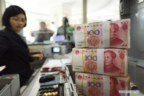Chinese banks' assets rise 15.7%