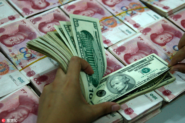 Chinese banks' net forex sales nearly halved in October