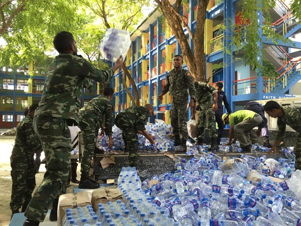Chinese military planes send water to Maldives