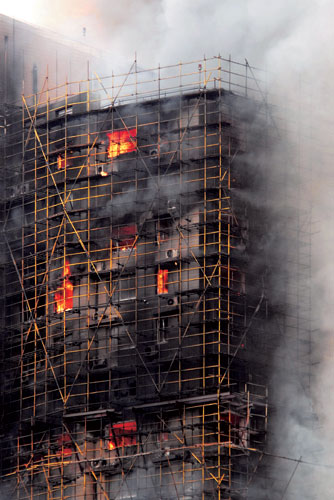 53 killed in Shanghai as fire engulfs high-rise