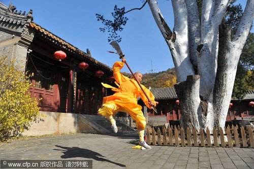Buddhist nun shows off her strength pulling cars