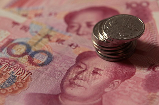 China to let yuan rise 5% in 2011: paper
