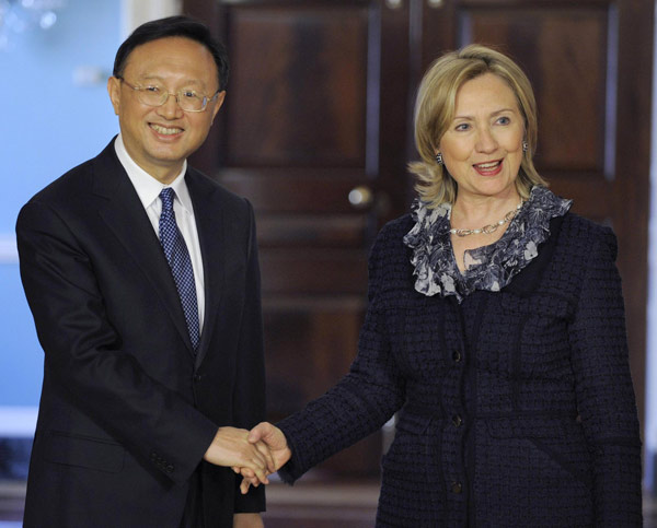 FM meets Clinton before Hu's US visit
