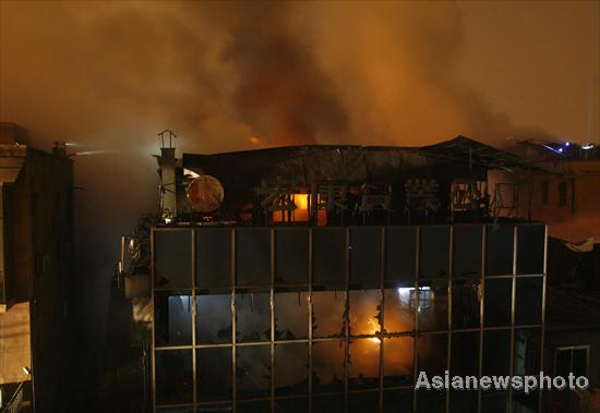 14 dead in building fire in C China