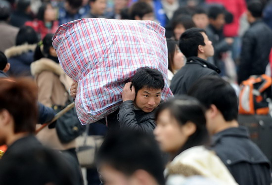 Back again, mass migration tests China's rails