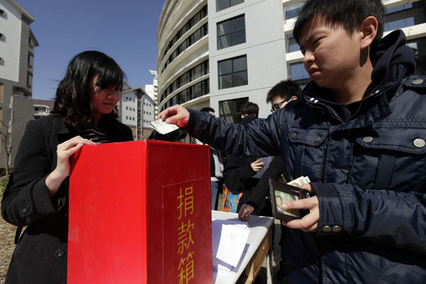 Students donate money for Japan's quake relief