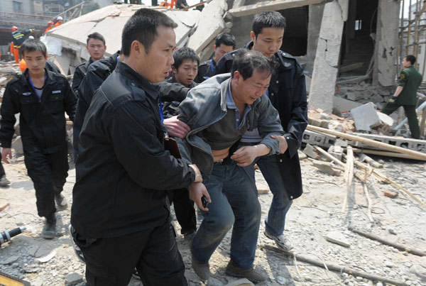 Building collapse leaves 6 dead, 15 injured in SW China