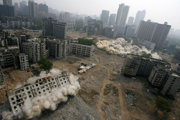 Old buildings demolished by directional blasting