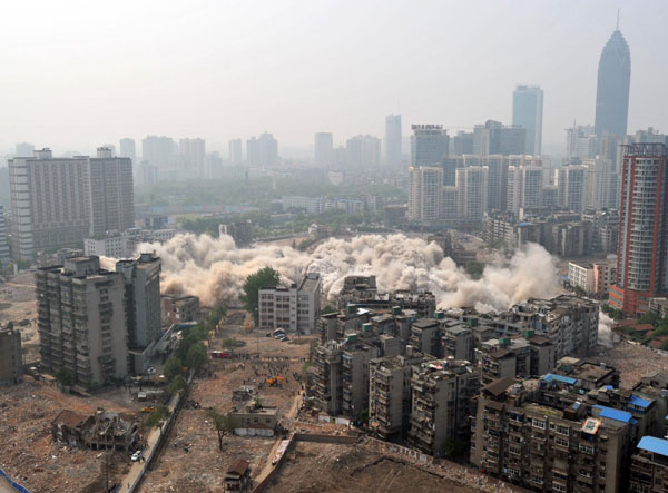 Old buildings demolished by directional blasting