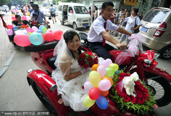 The blushing bride on a motorbike