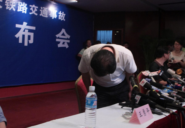 Ministry spokesman bows to train victim