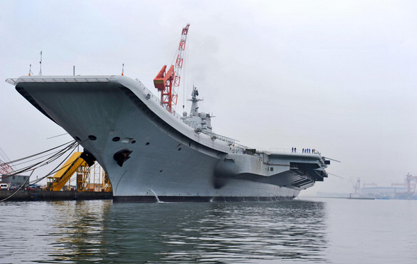China's refitted aircraft carrier starts sea sail