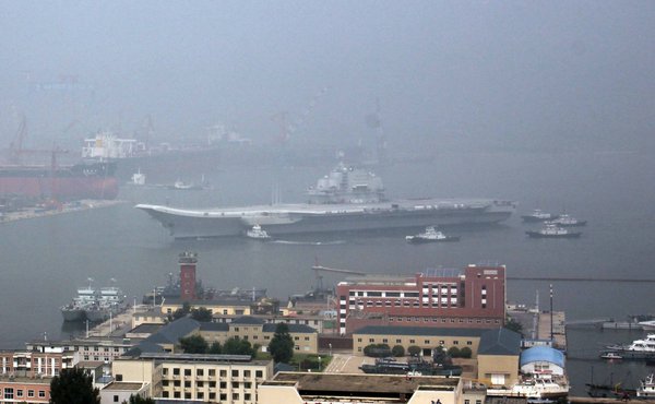 Carrier returns to Dalian after maiden sea trial