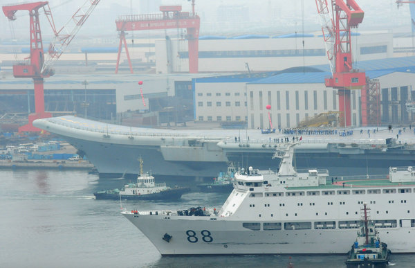 Carrier returns to Dalian after maiden sea trial