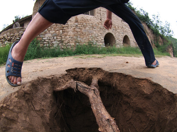 Ground collapses under mined N China village