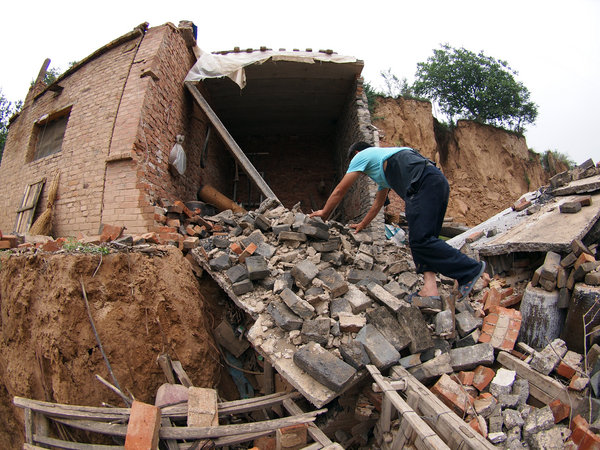 Ground collapses under mined N China village