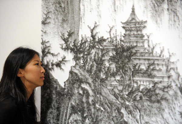 A traditional Chinese painting is made with nails by an artist from Taiwan, Chen Junhao, in Taipei on August 31, 2011. His works will be shown in Shanghai in September. Chinese paintings created by nail art