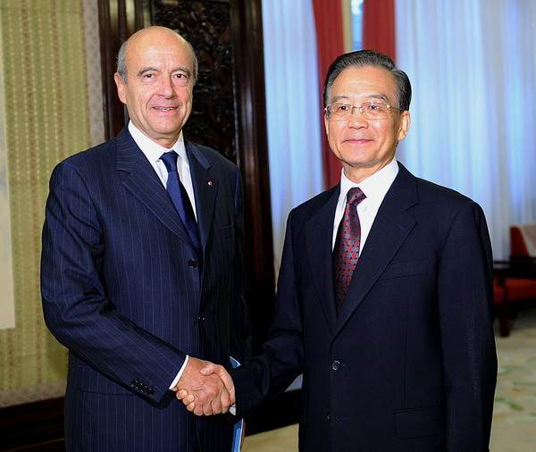 Wen meets French FM to discuss bilateral ties