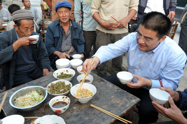 Chen Guangbiao plans feast for 5,000 households