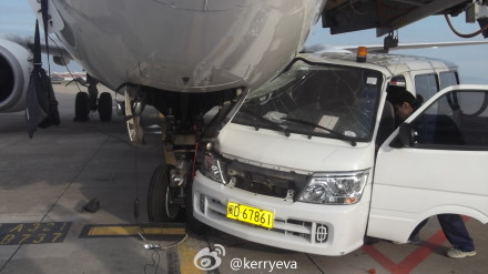 Airport van hits parked plane in Xiamen