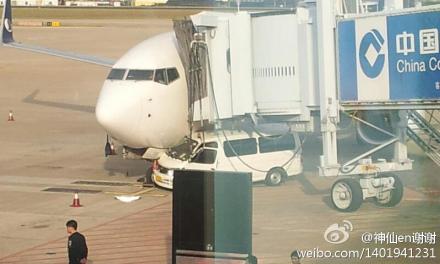 Airport van hits parked plane in Xiamen