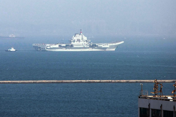 Aircraft carrier sails from port for new test