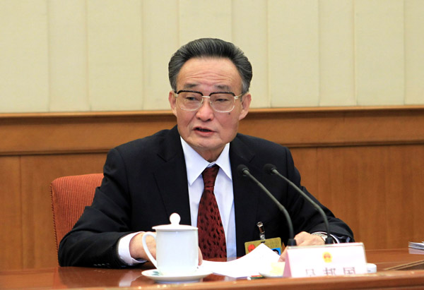 Chinese legislature reviews draft laws, amendments