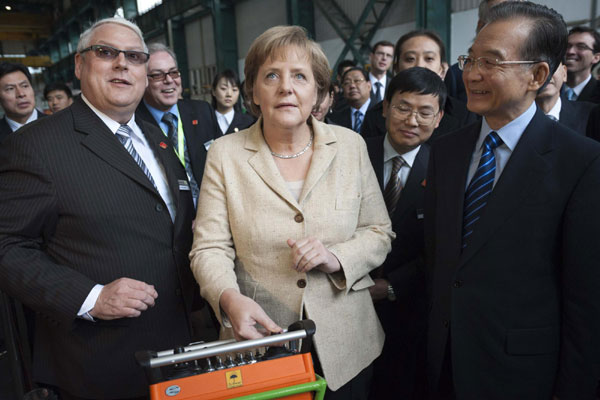 Wen, Merkel visit tunnelling equipment Co in Guangzhou