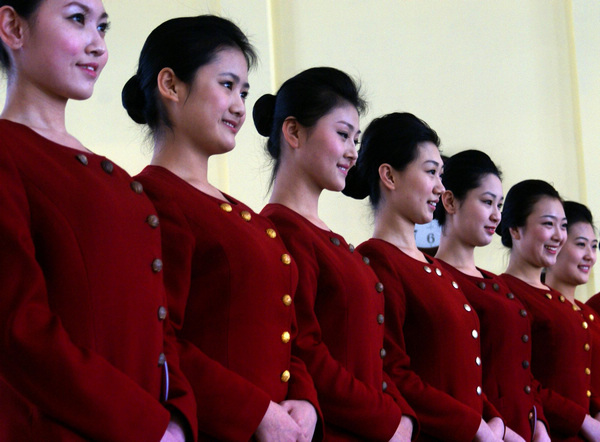 Stewardess applicants prepare for job interviews