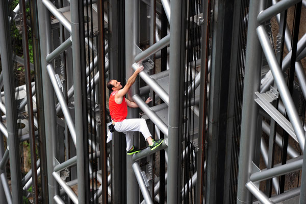 French 'spiderman' scales highest outdoor elevator