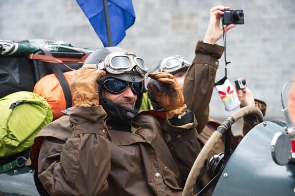 A ceremony marks the beginning of the Beijing-to-Paris classic car rally at Juyongguan, Beijing, near the Great Wall, May 28, 2013. Beijing-to-Paris classic car rally launched