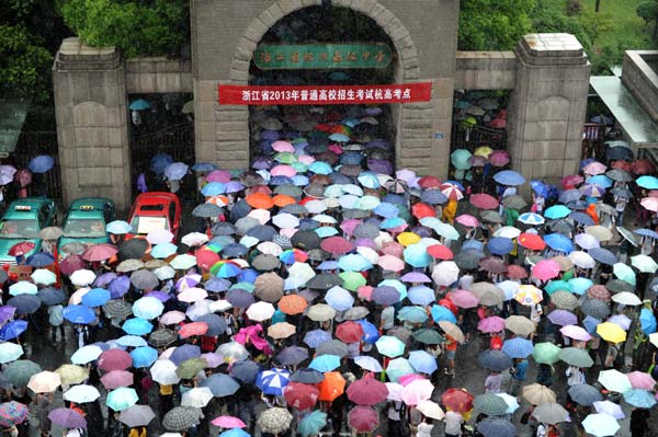 World's largest exam undergoing amid downpours