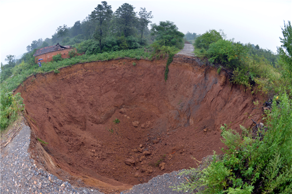 Giant sinkholes plague Hubei mining region