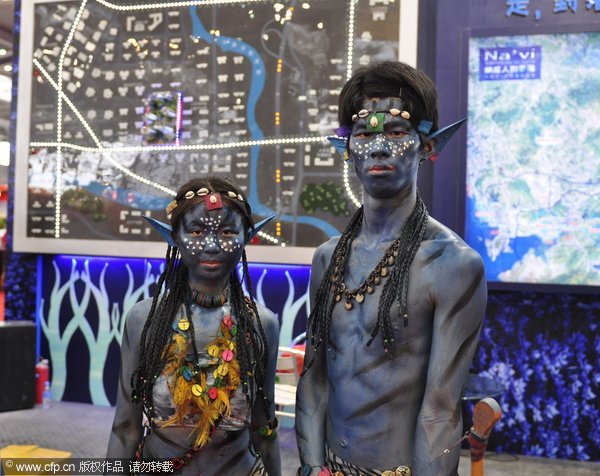 Avatar imitators in Shenzhen, South China’s Guangdong province, April 30, 2011. The beauty and beasts of selling hot houses