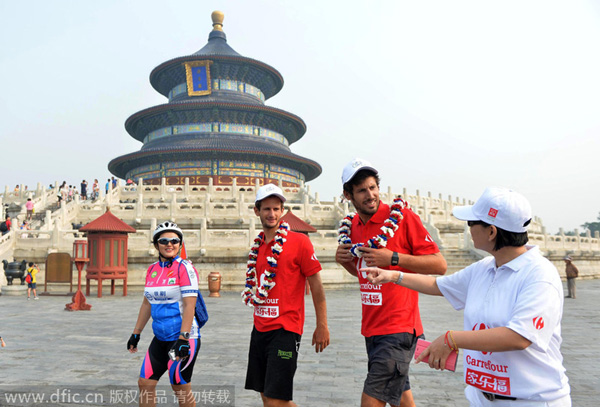 Duo ends pedal-powered journey from Paris to Beijing