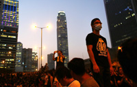 Protest disrupts life in Hong Kong, depresses stocks