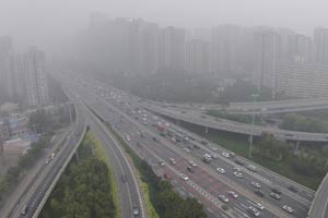 China province orders 30% of vehicles off roads for APEC