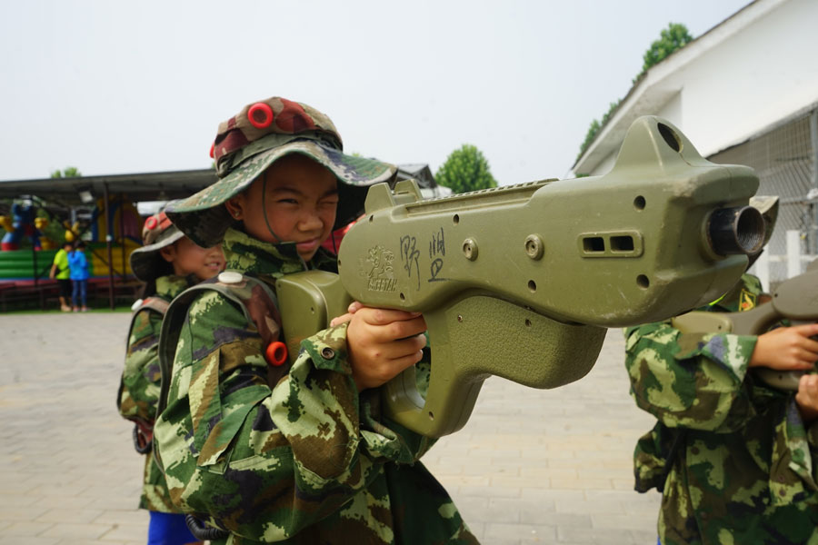 Left-behind children from remote areas visit Beijing