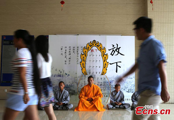 Shaolin monks fail to wean people off cellphones